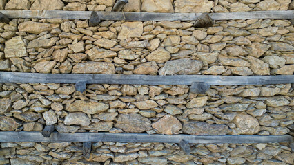 Button Houses, walls and construction workmanship were made using dry construction technique and...