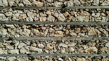 Button Houses, walls and construction workmanship were made using dry construction technique and wood.