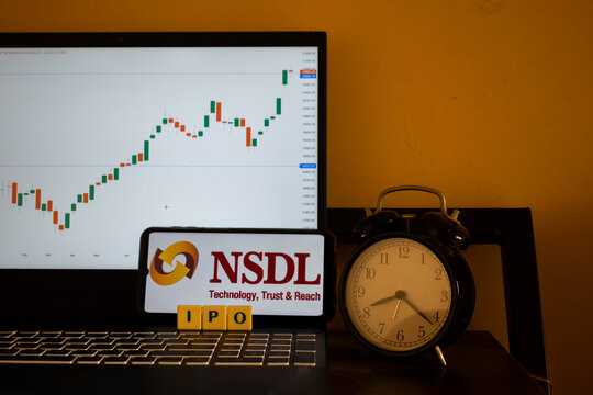 Picture of logo of NSDL along with alarm clock, letter blocks arranged as IPO and stock market chart in background. Share, price, gmp, face value, split, bonus, right