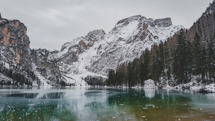 Lago di Braies frozen during winter season with a beautiful mountain panorama © Rodrigo