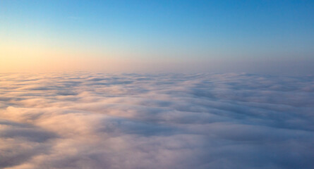 Dawn's Awakening: Illuminating the Sky Beyond the Cloud Veil