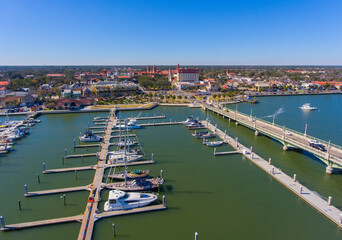 Matanzas Bay coast aerial view with downtown St. Augustine skyline at the background, city of St. Augustine, Florida FL, USA.