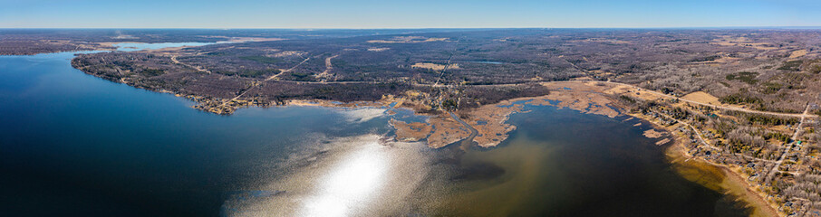 Expansive aerial views over Tay Township, Simcoe County, Ontario, capture the grandeur of the...