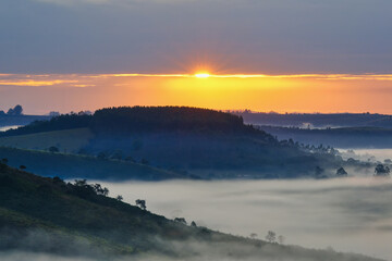 Obraz premium Early morning fog over valleys and mountains, Serra da Canastra, Minas Gerais state, Brazil