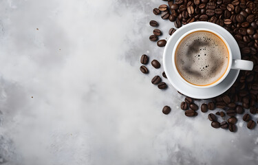 coffee cup and coffee beans on grey snowy background top view
