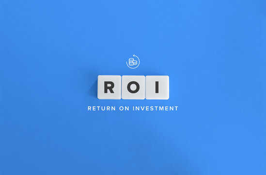 Return on Investment (ROI) or Return on Costs. Text on Block Letter Tiles and Icon on Flat Blue Background. Minimalist Aesthetics.