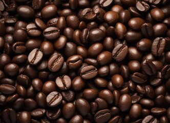 Fototapeta premium close up view of dozens coffee beans, above view 