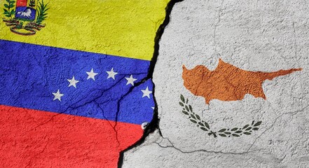 Venezuela and Cyprus flags on a stone wall with a crack, illustration of the concept of a global crisis in political and economic relations