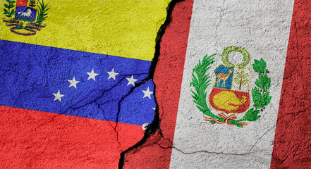 Venezuela and Peru flags on a stone wall with a crack, illustration of the concept of a global crisis in political and economic relations