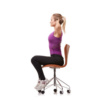 Office, chair and woman stretching for posture, health and fitness in white background or studio. Sitting, exercise and person training arms with seated core stretches or practice for wellness
