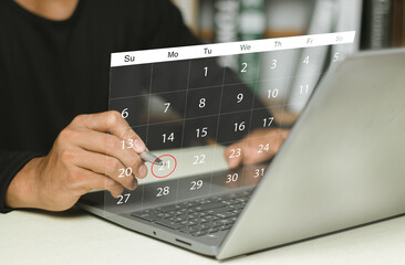 Businessman manages time for effective work. Calendar on the virtual screen interface. Highlight...
