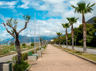Sea promenade in the south of Italy with views of the sea, mountains, and picturesque landscapes