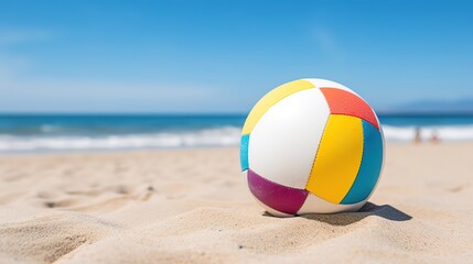 closeup photo of beach ball white sand beach background