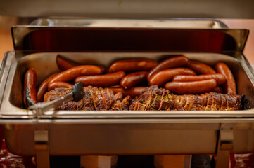 Finest Pinkel sausage and mouthwatering kassler as buffet. Rustic buffet featuring the delectable...
