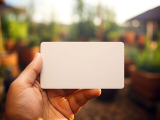  man holding a Bussines Card Mockup Clean and simple that is great for presenting your logo designs. It is easy to place your designs with Smart Objects, 