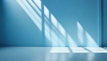 Fototapeta premium minimal abstract light blue background for product presentation shadow and light from windows on wall