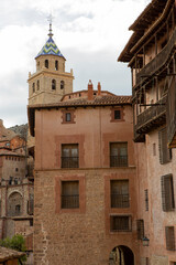 Facades of the old houses of the medieval and touristic village of Albarracín in Teruel (Spain).