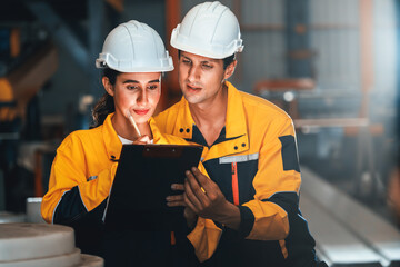 Professional quality control inspector conduct safety inspection on steel machinery and...