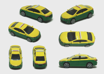 Yellow green steel taxi model children toy popular on street in Bangkok of Thailand