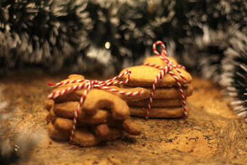 Christmas gingerbread cookies on a wooden background, baking