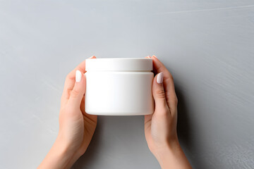 Female hands holding jar of cosmetic cream Cosmetic beauty product branding mockup