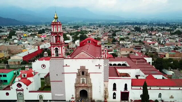 HD aerial video in a dolly in shot of the Parish of Our Lady of the Assumption in Amecameca, State of Mexico.
