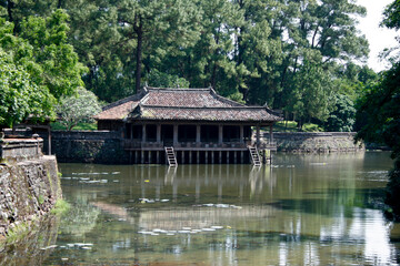 Fototapeta na wymiar Pavilion by the pond at the Tomb of the Emperor Tu Duc in Hue city