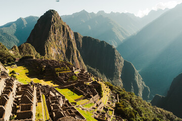 Machu Picchu old Inca ruins at sunrise in Peru - obrazy, fototapety, plakaty