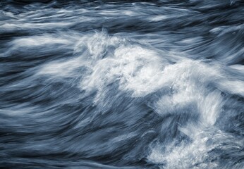 dramatic detail of the raging waves of the blue river - obrazy, fototapety, plakaty