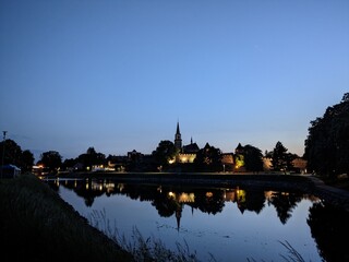 Obraz premium Nymburk historical town on Labe river(Elbe) with its bridges water ways and historical city center in Podebrady region, Bohemia,Czech republic,Europe