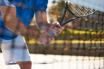 Tennis match, fitness and hands in outdoors, competition and man playing on court at country club. Athlete, training and exercise or racket for game, performance and practice or workout at stadium