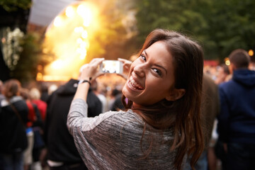 Woman, music festival and cellphone picture of stage entertainment, party concert or crowd...