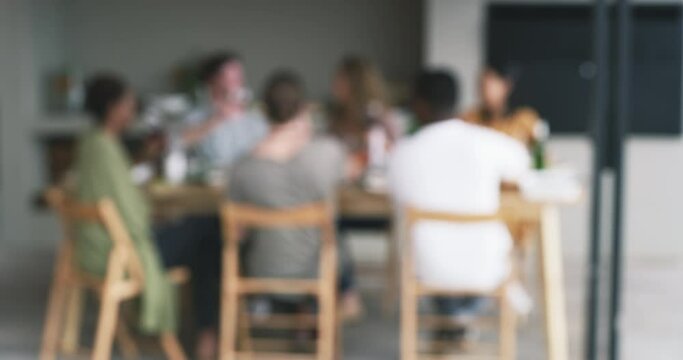 People, cheers or blur at dinner party by table, together or alcohol for social event in home. Gratitude, men and women for toast in summer celebration, holidays and diversity with talking in house