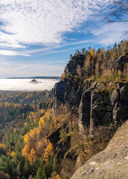 Autumn view of sandstone cliffs in the Elbe River valley, near Dresden. National Park Saxon Switzerland, Germany. Famous tourist destination