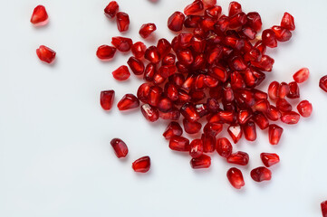 juicy pomegranate seeds on white background 6
