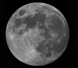 Photograph of the full moon, taken with a camera on a day of a large full moon. Craters, relief and characteristic areas of the moon