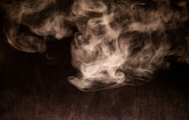 Blur white water vapour on isolated black background. Abstract of steam with copy space.