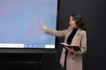 asian female professor giving biology lecture in the university