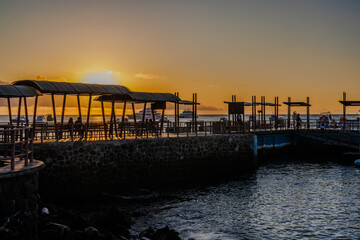 sunset over the pier in Galapagos