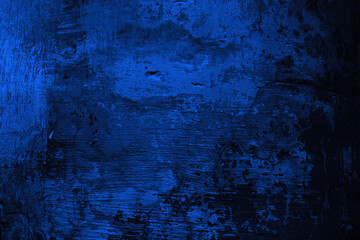 Black dark navy blue texture background for design. Toned rough concrete surface. A painted old building wall with cracks. Close-up. Distressed, broken, crushed, collapsed, destruction.