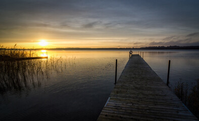 Idyllic sunrise over the Swedish lake - 693244179