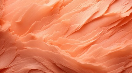 Closeup of a Peach Fuzz colored backdrop with a gradient of beautiful blush tones