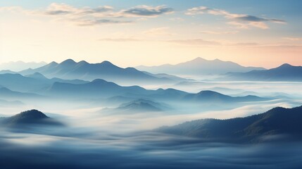 Fototapeta premium A high-altitude view of a misty valley at sunrise, with layers of mountains in the distance.
