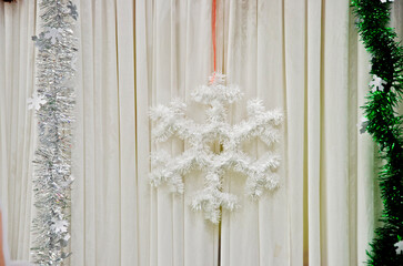 Beautiful bright star snow on white curtain