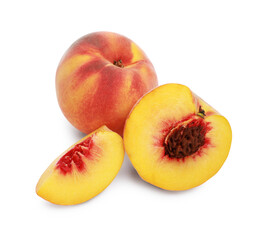Whole and cut delicious peaches isolated on white