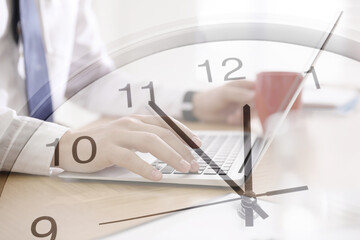 Time concept. Double exposure of man working on laptop and clock