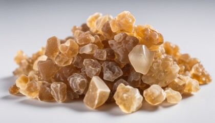 A pile of sugar cubes on a white background