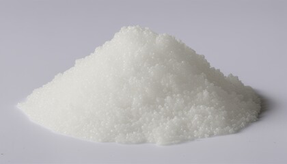 A pile of white sugar on a white background