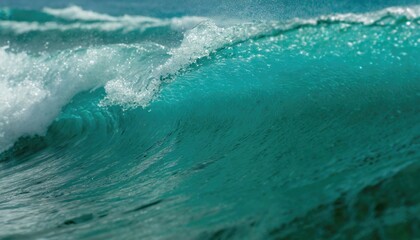 Close up of blue waves on the beach.