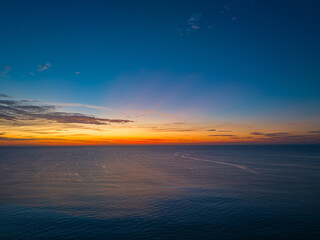 .aerial panorama beautiful sunset at Surin beach Phuket..amazing colorful cloud in beautiful sky at sunset..Scene of Colorful romantic sky sunset with cloud in the sky background..